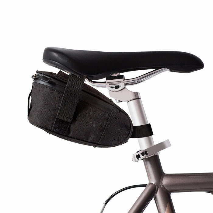 Black Ripstop Po Campo Hudson Saddle Bag mounted onto bike seat. Side view.