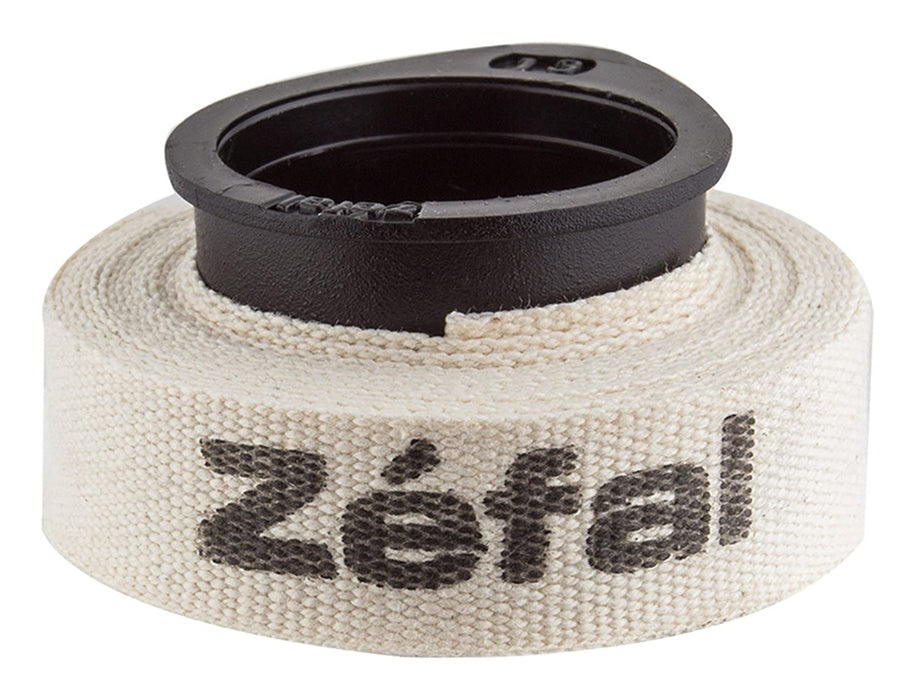 Roll of white zefal cloth rim tape with black Zefal lettering, on a black spool